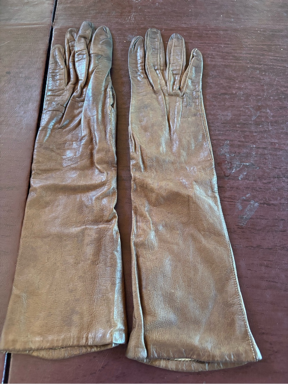 Vintage made in France brown leather gloves size 6.5 unlined silk mid length